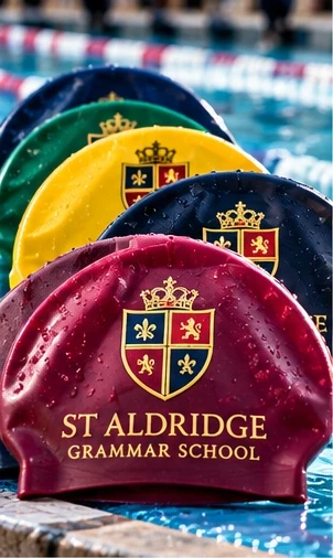 Supplied illustrative School House Swim Caps beside a swimming pool